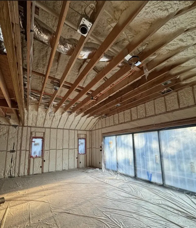 Interior walls and ceiling insulated with spray foam during new construction in Rifle
